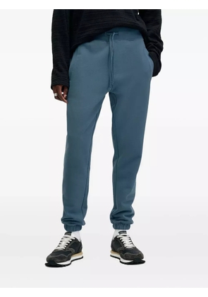 AllSaints Raven logo-embroidered track pants - Blue
