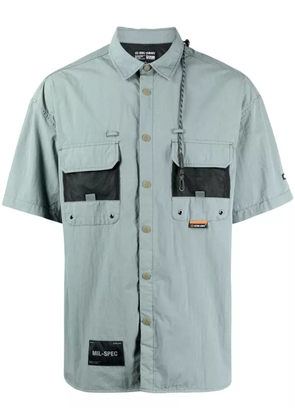 izzue multiple-pockets short-sleeved shirt - Green
