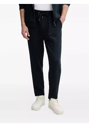 Joop! quilted logo-plaque pants - Blue