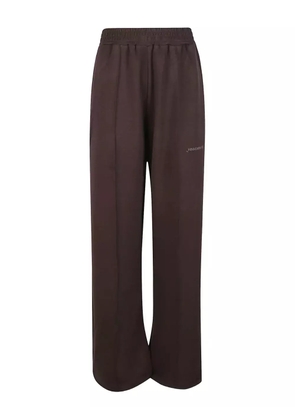 HINNOMINATE logo-print track pants - Brown
