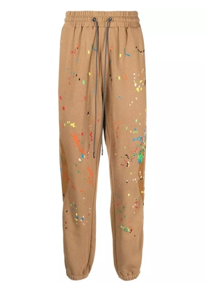 Mostly Heard Rarely Seen Warped paint-embroidered track pants - Brown