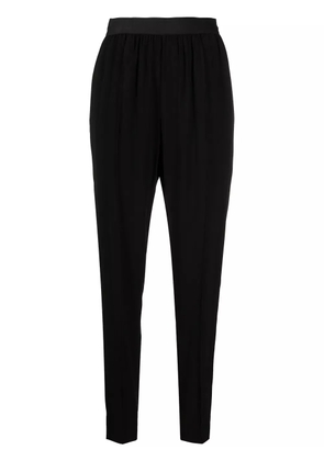 Maison Margiela elasticated waistband tapered trousers - Black