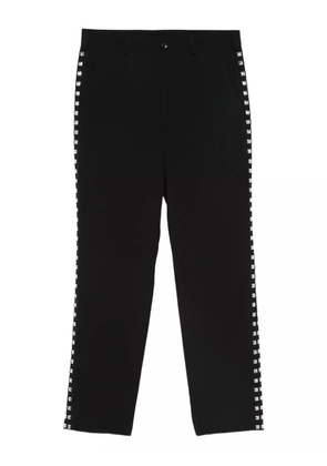 Black Comme Des Garçons wool trousers