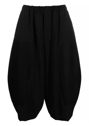 Black Comme Des Garçons elasticated-waist wool cropped trousers
