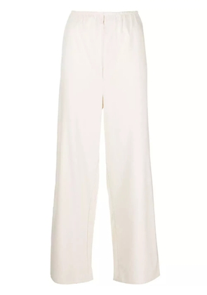 Baserange elasticated-waist silk palazzo pants - White
