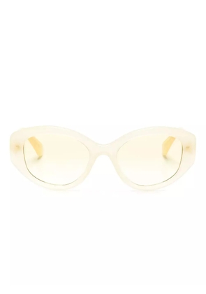 Swarovski Eyewear crystal-embellished oval-frame sunglasses - Yellow