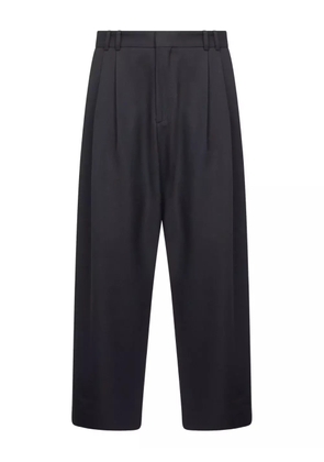 Studio Nicholson double -pleat wide-leg trousers - Black