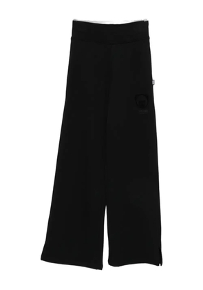 Moschino teddy-logo pants - Black