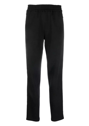 Emporio Armani logo-tape track pants - Black