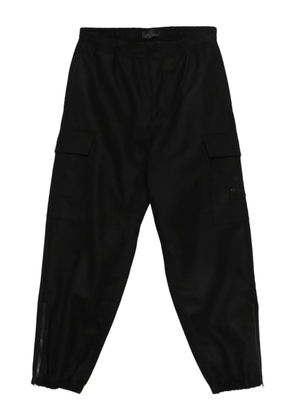 Stone Island cargo zipped-ankle trousers - Black