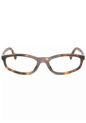 Miu Miu Eyewear oval frame glasses - Brown