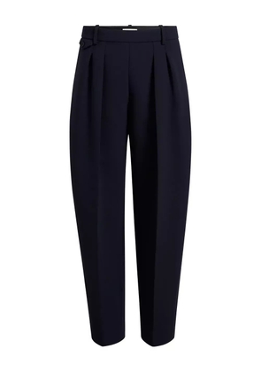 KHAITE button-detail pleated trousers - Blue