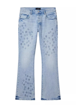 Purple Brand monogram-embossed flared jeans - Blue