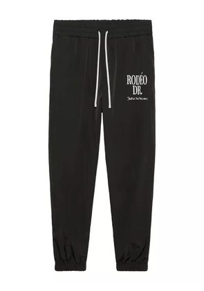 1989 STUDIO logo-print track pants - Black
