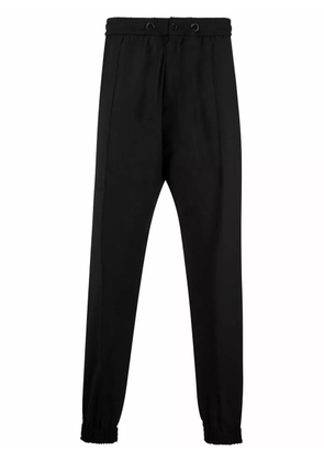 Philipp Plein skull-motif rhinestone track trousers - Black