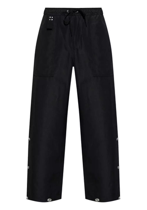 Comme des Garçons Homme decorative button trousers - Black