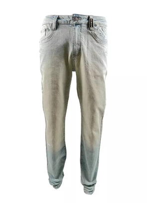 GUAPI embroidered-pocket jeans - Blue