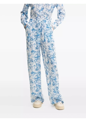 Melissa Odabash leaf-print trousers - Blue
