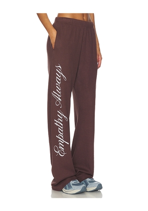 The Mayfair Group Empathy Always Waffle Wide Leg Sweatpants in Brown. Size L/XL. Also in M/L, S/M, XS.