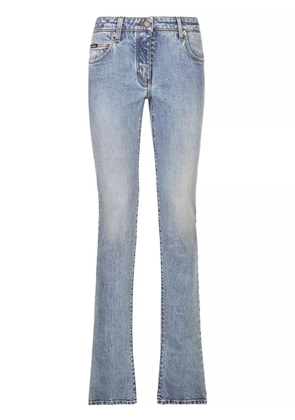 Dolce & Gabbana logo-patch low-rise bootcut jeans - Blue