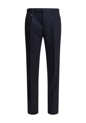 Prada triangle-logo trousers - Blue