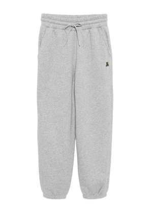 izzue bear-embroidered trousers - Grey