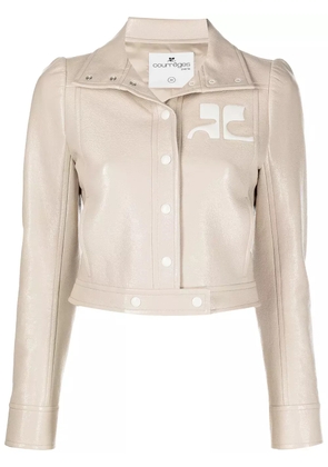 Courrèges logo-embossed cropped vinyl jacket - Neutrals