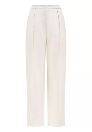 12 STOREEZ pressed-crease linen trousers - White