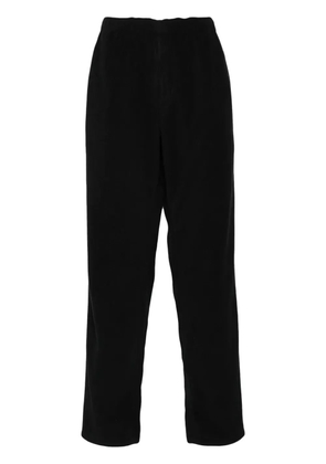 Undercover appliqué logo straight-leg trousers - Black