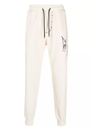 MJB Marc Jacques Burton graphic-print track pants - Neutrals