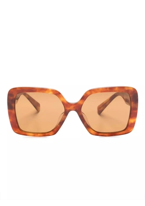 Miu Miu Eyewear tortoiseshell logo-arm sunglasses - Brown
