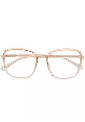 Chloé Eyewear oversize transparent-effect glasses - Orange