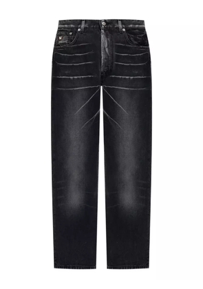 Moschino logo-plaque faded-wash jeans - Black