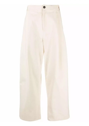 Studio Nicholson Sorte wide-leg pleated trousers - Neutrals