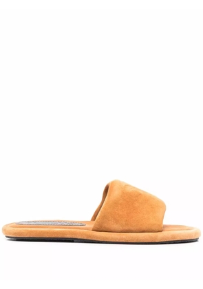 Nanushka logo-embossed leather sandals - Yellow