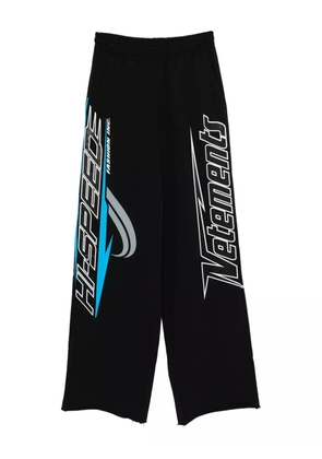 VETEMENTS graphic-printed trousers - Black