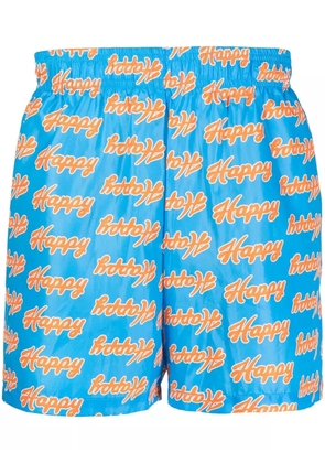 Natasha Zinko Happy-print swim shorts - Blue