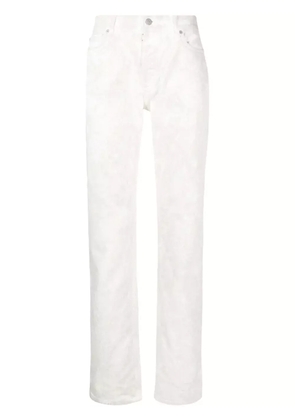 Maison Margiela bleached-wash slim-cut jeans - White