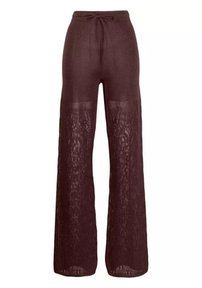 Nanushka logo-knit crochet trousers - Brown