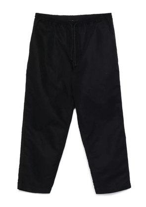 Comme des Garçons Homme tapered-leg trousers - Blue