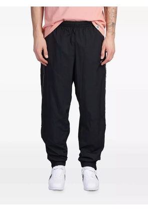 Nike Solo Swoosh track pants - Black