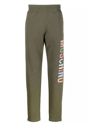 Moschino logo-print track pants - Green