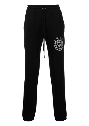 AMIRI slim-cut logo-print track pants - Black
