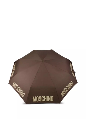 Moschino logo-print umbrella - Brown