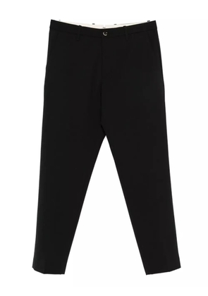 Nine In The Morning button-fastening trousers - Black