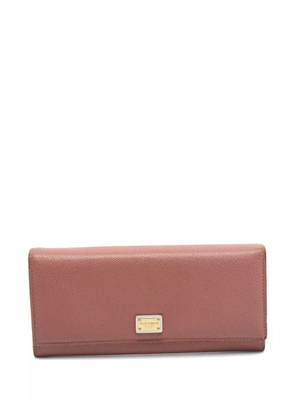 Dolce & Gabbana Pre-Owned 2024 logo-plaque wallet - Pink