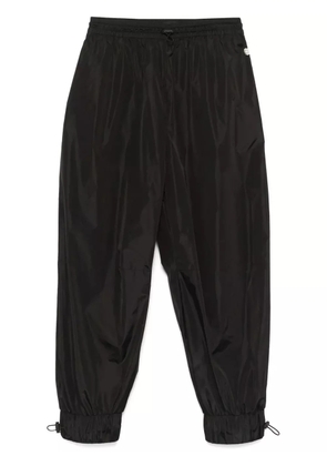 Simone Rocha daisy-embellished track pants - Black