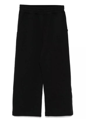 Moschino logo-raised sweatpants - Black
