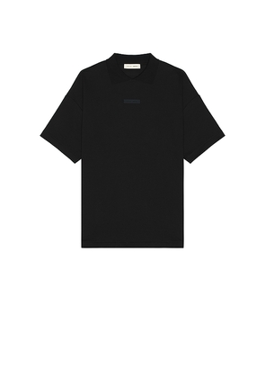 Fear of God ESSENTIALS 90s Fit Pique Polo in Black. Size L. Also in M, S, XL/1X.