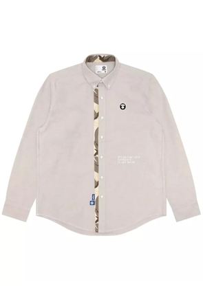 AAPE BY *A BATHING APE® Moonface-embroidered cotton shirt - Neutrals